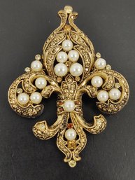 VINTAGE GOLD TONE FLEUR DE LIS BROOCH