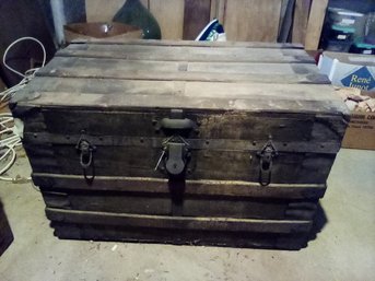 Vintage Wood Trunk With Wall Papered Interior & Recessed Metal Wheels Underneath