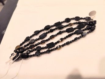 Beautiful Black Beads With Brown Coppery Undertones