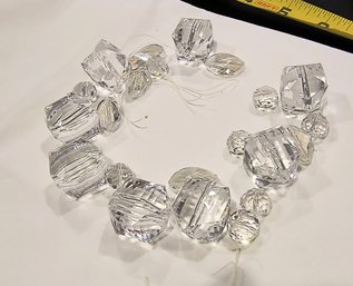 Various Size And Shapes Group Of Transparent Beads