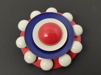 VINTAGE RED WHITE AND BLUE ENAMEL ON METAL FLOWER BROOCH