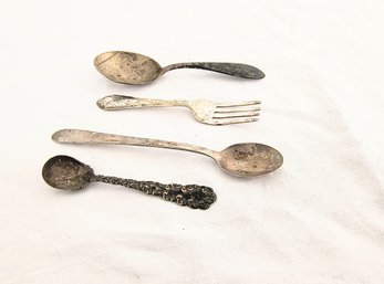 Four Sterling Silver Antique Spoons