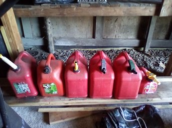 Five 5-gallon Gas Containers - 1 Has About A Gallon In It Still & 1.25 Mixed Gas/oil