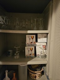 Contents Of Cabinet Includes Lots Of Stemware And Serveware