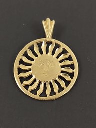 SMALL VINTAGE 14K GOLD ETCHED SUN FACE PENDANT