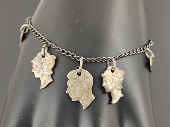 VINTAGE STERLING SILVER CUT SILVER COINS CHARM BRACELET