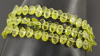 STUNNING STERLING SILVER MULTI STRAND FACETED PERIDOT BEADED BRACELET