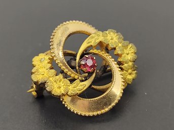ANTIQUE GOLD FILLED RUBY COLORED PASTE STONE WHIRL PIN