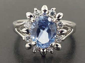 STUNNING SILVER PLATED BLUE TOPAZ & CZ RING