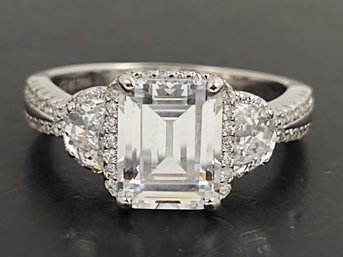 STUNNING STERLING SILVER EMERALD CUT CZ ENGAGEMENT RING