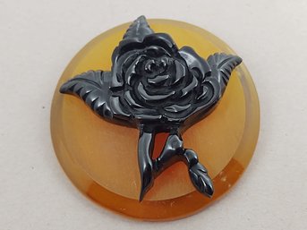 VINTAGE APPLE JUICE BAKELITE & CARVED BLACK LUCITE FLOWER BROOCH