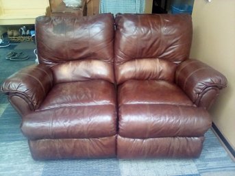 Leather Rocking Loveseat With Individual Manual Reclining Features  (Den)