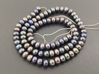 LOOSE STRAND OF 6mm - 6.5mm BLACK PEACOCK BUTTON PEARLS