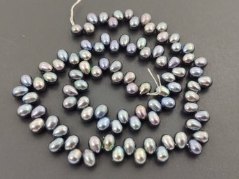 LOOSE STRAND OF 5.5mm - 6mm BLACK PEACOCK TEAR DROP SHAPED PEARLS