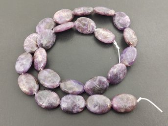 LOOSE STRAND OF LEPIDOLITE BEADS