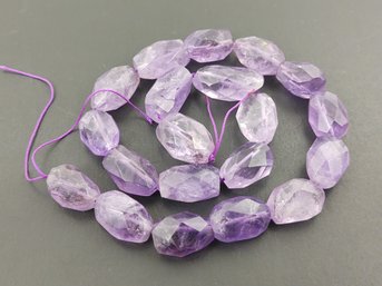 STRAND OF LOOSE CHUNKY FACETED NATURAL AMETHYST BEADS