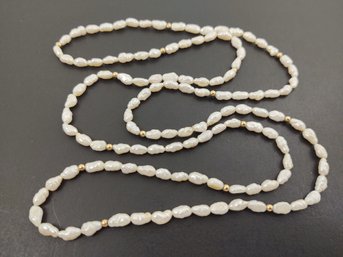 VINTAGE 14K GOLD RICE PEARL NECKLACE