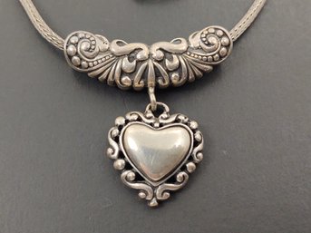 VINTAGE STERLING SILVER BALI STYLE DANGLE HEART NECKLACE