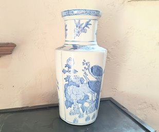 Blue And White Painted Ceramic Vase With A Floral Design