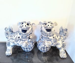 Pair Of Large Blue And White Painted Ceramic Foo Dogs