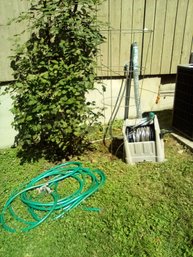 Leknor Apex  Hose, Gilmore Nozzle, New 48' X 10 Ft Poultry Net, Suncast Hose, Dramm Nozzle, Tomato Cage-front