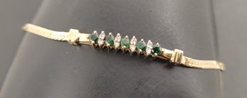 STUNNING 14K GOLD EMERALD & DIAMOND BRACLET