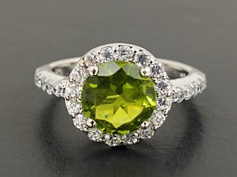 BEAUTIFUL STERLING SILVER GREEN CZ HALO RING