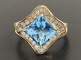 STUNNING 10K GOLD BLUE TOPAZ & DIAMOND RING