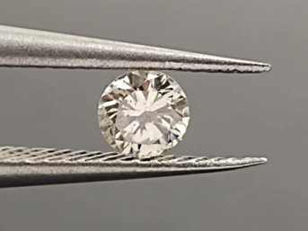 LOOSE 0.24ct DIAMOND W/ YELLOW TINT