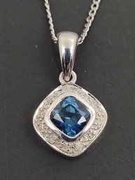 STUNNING STERLING SILVER BLUE TOPAZ & DIAMOND NECKLACE