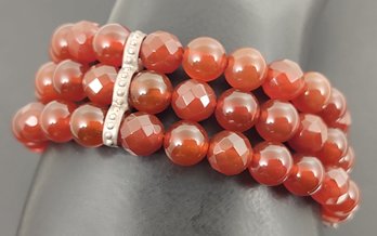 DESIGNER WHITNEY KELLY STERLING SILVER FACETED CARNELIAN STRETCH BRACELET