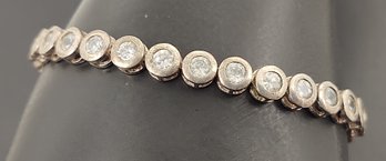 VINTAGE STERLING SILVER BEZEL SET CZ TENNIS BRACELET