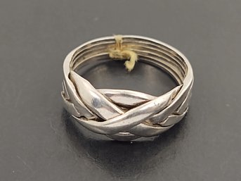 VINTAGE STERLING SILVER PUZZLE RING