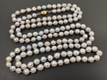 STUNNING VINTAGE 14K GOLD 7mm - 8mm LIGHT BLUE BARQUE PEARL NECKLACE 49'