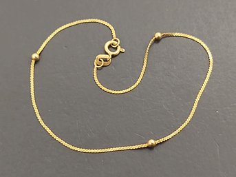 VINTAGE 14K GOLD THIN SERPENTINE LINK STATION BRACELET