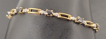 VINTAGE 10K GOLD BLUE SAPPHIRE & DIAMOND TENNIS BRACELET