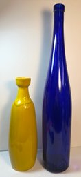 Cobalt Blue Glass And A Yellow Vase