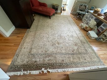 A PAKISTANI HAND WOVEN ROOM SIZED RUG