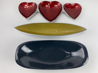 Three Servers - Red Hearts, Yellow Crudits, And Black Oval Bowl