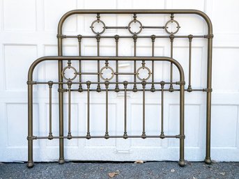 An Antique Cast Iron Full Size Headboard And Footboard