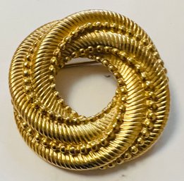 SIGNED CROWN TRIFARI GOLD TONE SWIRL FORM BROOCH