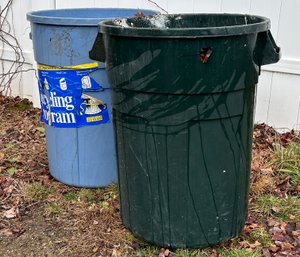 A Pair Of Plastic Trash Cans