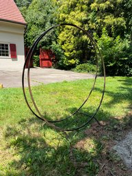 A Sturdy Steel Hoop Log Holder