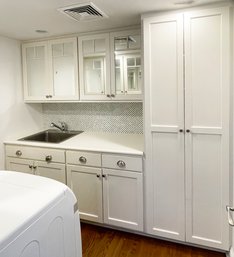 A Wall Of Custom Pantry Cabinetry, Stainless Undermount Sink And Manufactured Stone Counter - WOW!