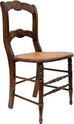 An Antique Cane Seated Side Chair