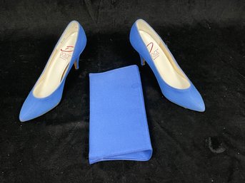 Pair Of Women's Shoes And Purse