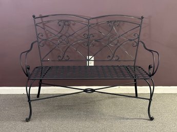 An Outdoor Bench In Metal With A Strap Seat