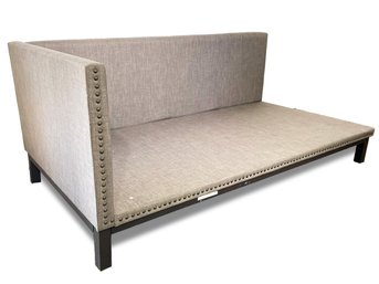 A Modern Day Bed In Grey Linen With Nailhead Trim