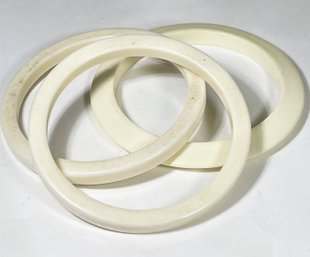 Three Vintage Plastic White Bangle Bracelets