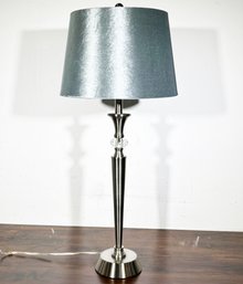 A Modern Chrome And Glass Table Lamp